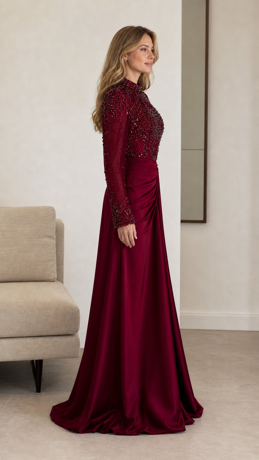Side profile view of burgundy beaded bodice long sleeve formal maxi dress