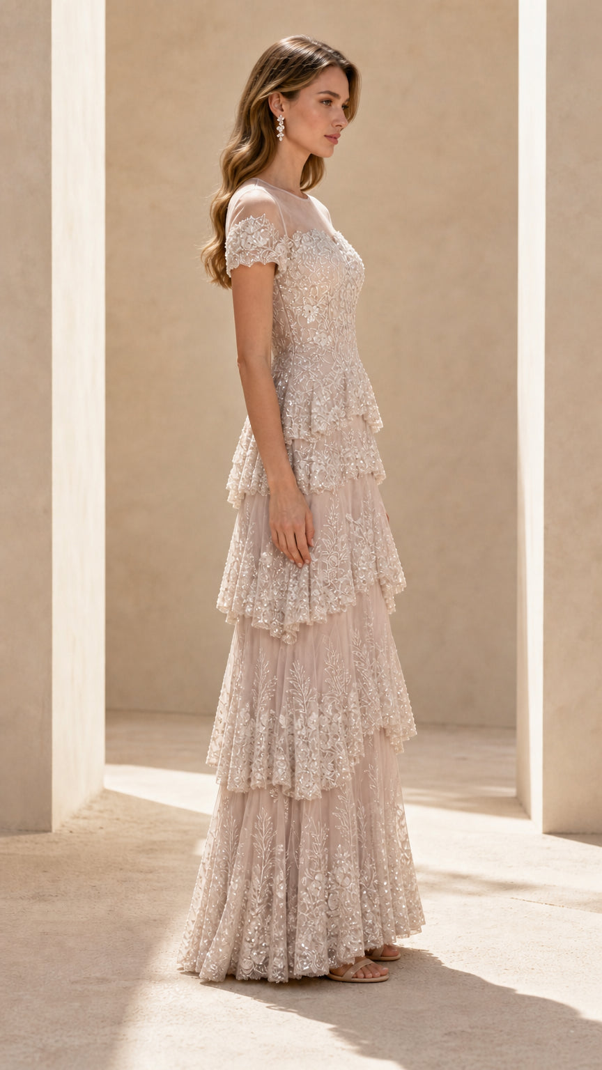 Side profile of champagne sequin tiered evening dress with short sleeves