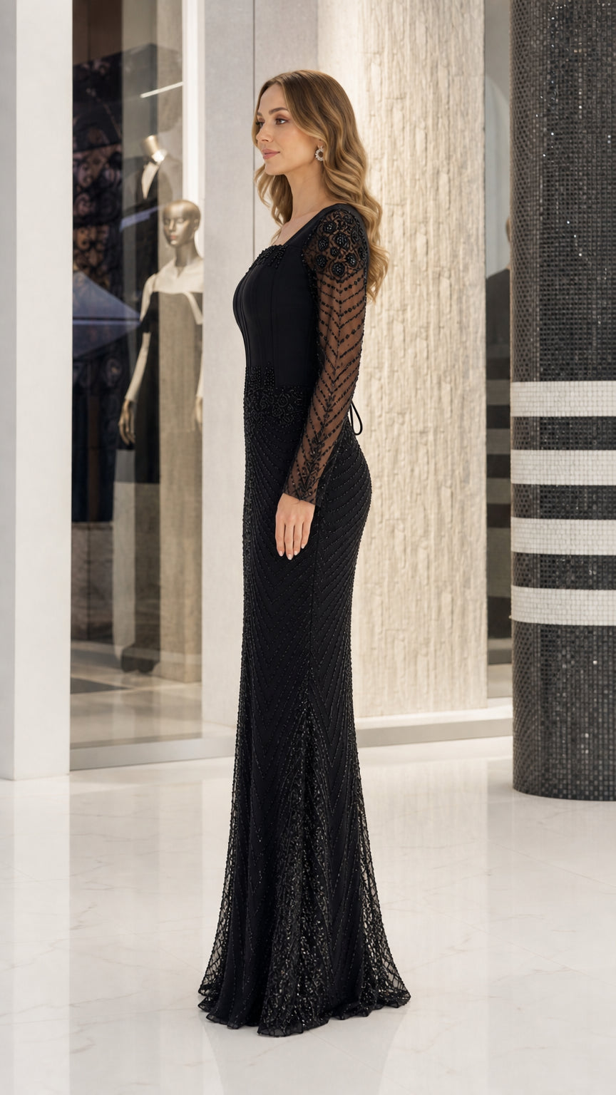 Side profile of elegant black beaded maxi gown with corset bodice