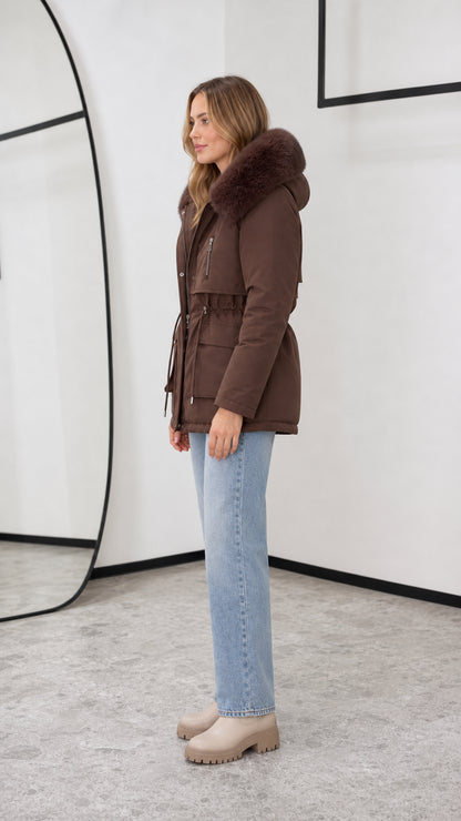 Side view of chocolate brown drawstring waist hooded winter parka jacket