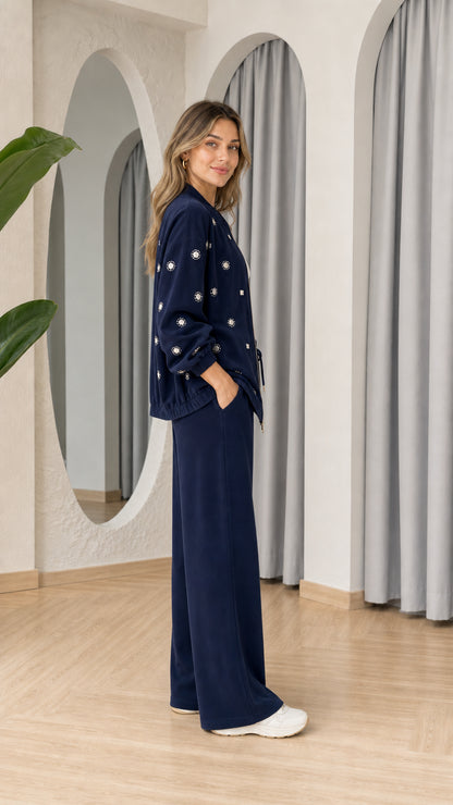 Model wearing Navy Blue embellished loungewear set, side profile view