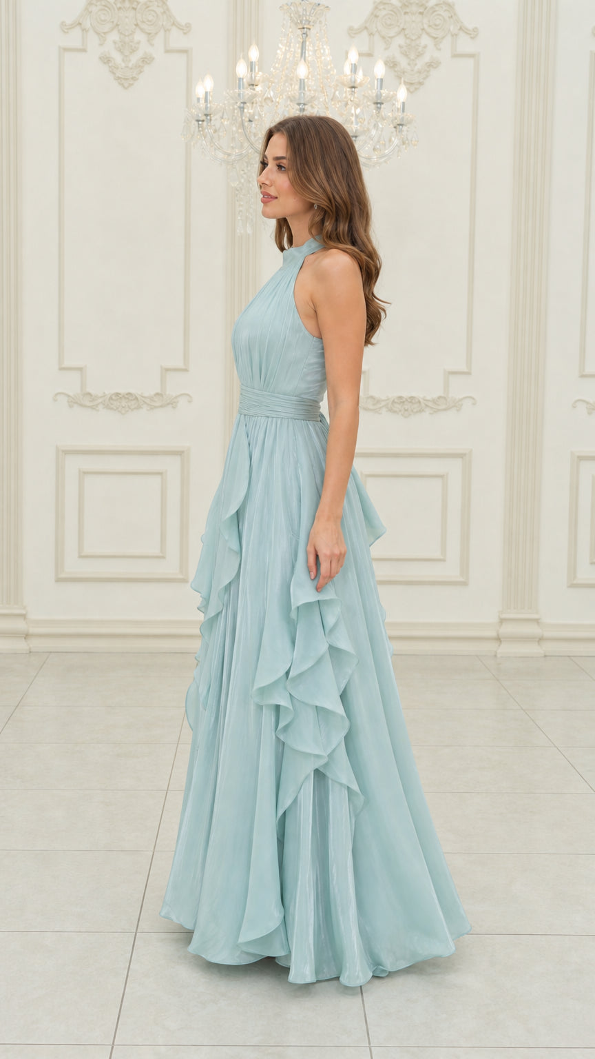 Side profile of woman wearing light blue pleated ruffle evening gown