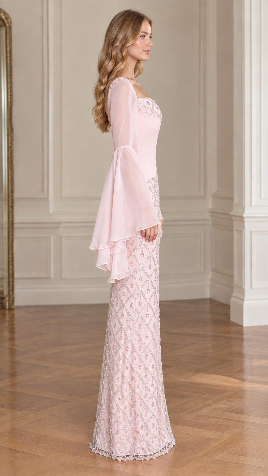 Side angle of model in Blush Pink embellished column maxi dress