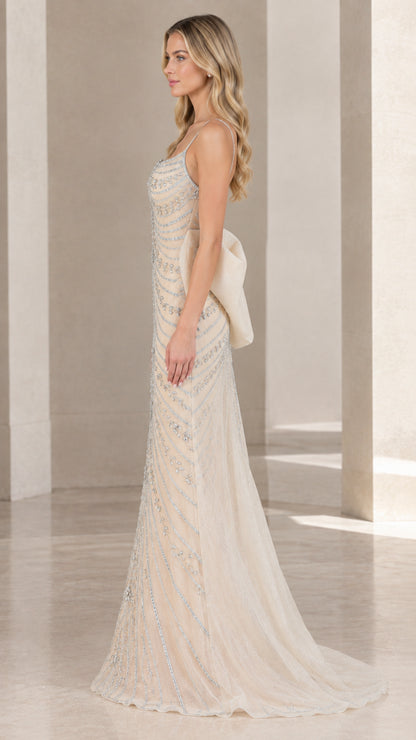 Side profile of champagne beaded formal gown showing slim silhouette