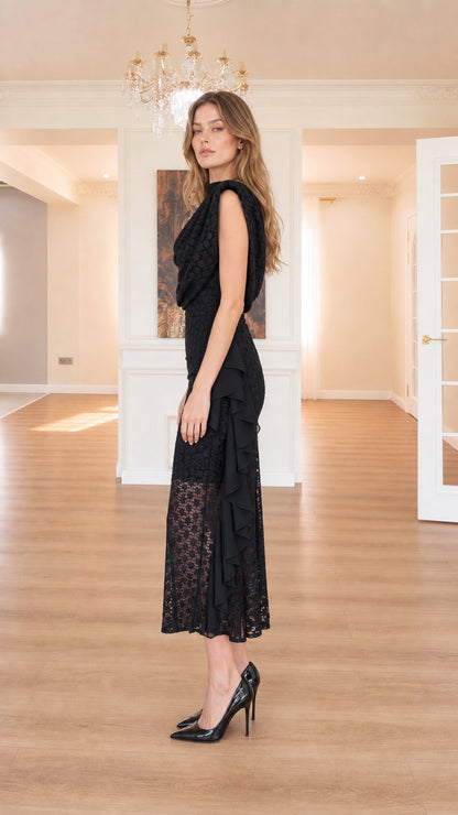 Side view of black sleeveless lace midi dress with cascade ruffle detail