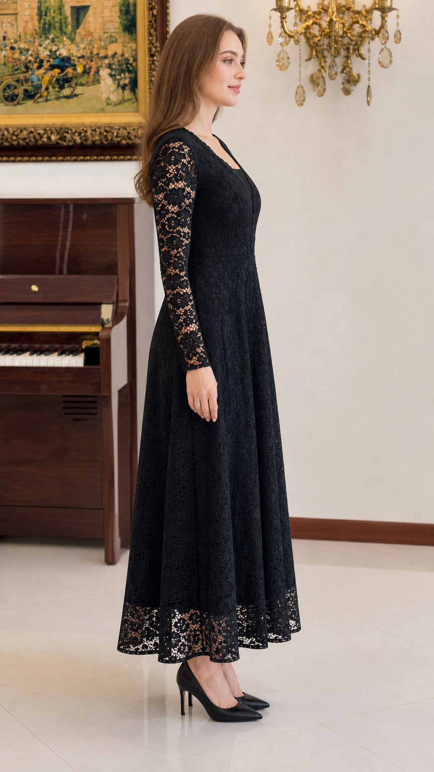 Side profile of woman wearing black long sleeve lace A-line maxi dress