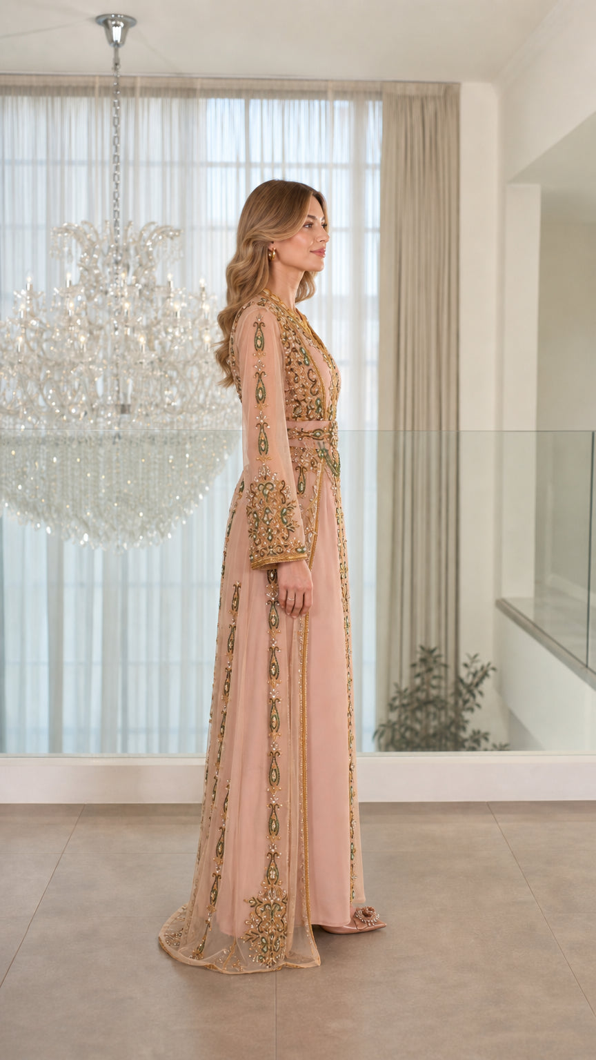 Side profile of dusty pink beaded formal kaftan gown showing sleeve and waist detailing