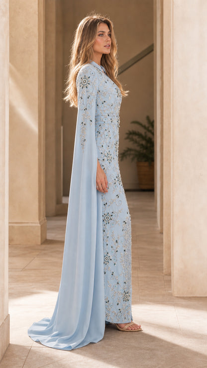 Side profile view of light blue cape sleeve formal dress
