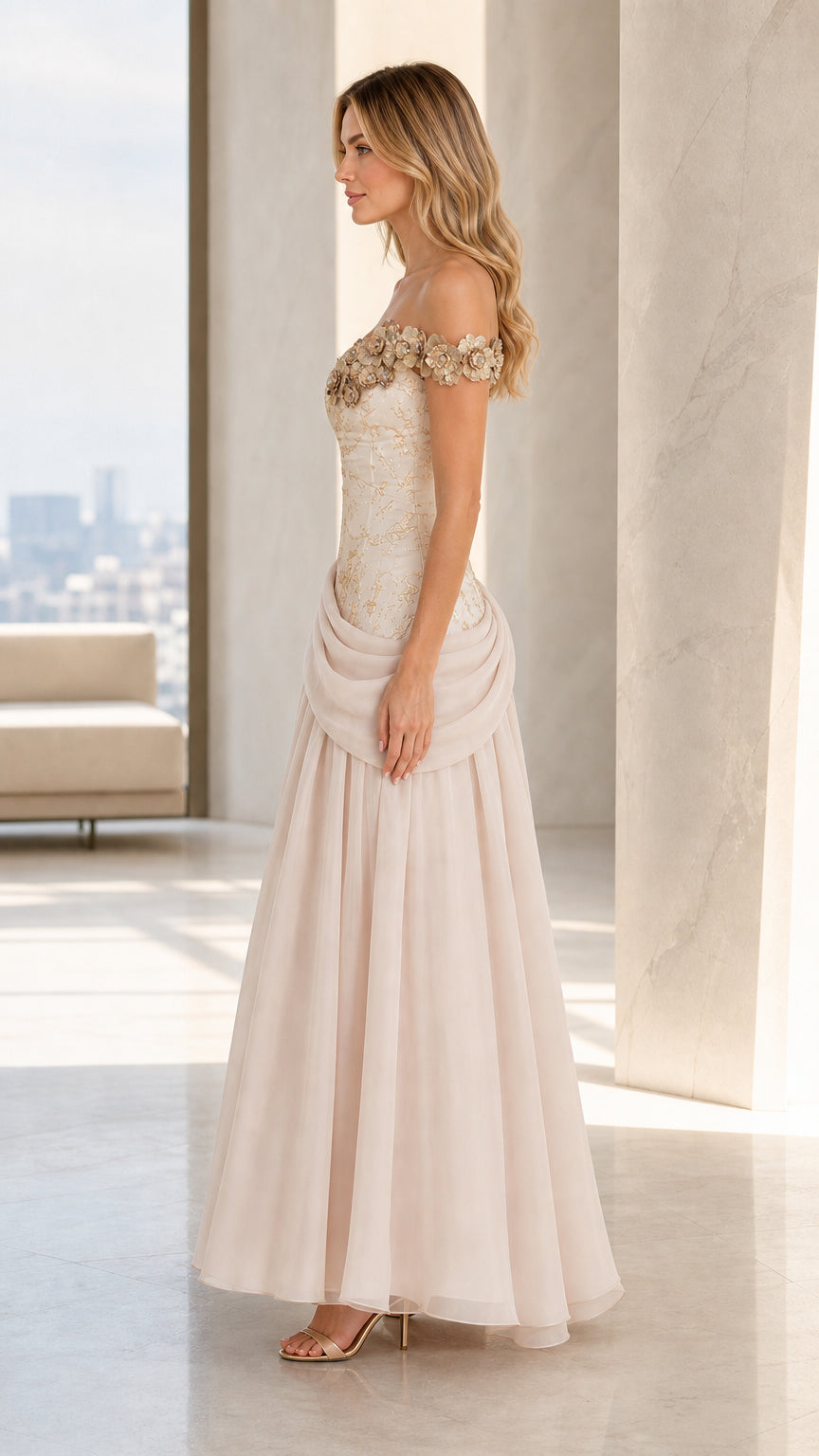 Side profile view of Champagne off-the-shoulder formal gown with draped waist