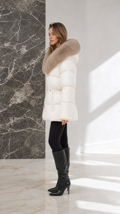 Side angle view of model wearing off-white hooded puffer jacket with cinched drawstring waist