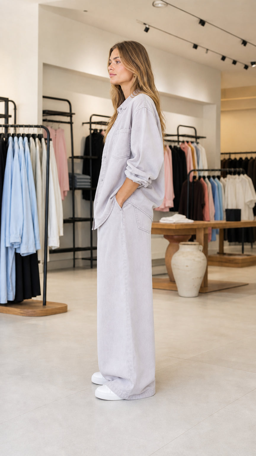 Side profile view of relaxed light grey matching two-piece pant set