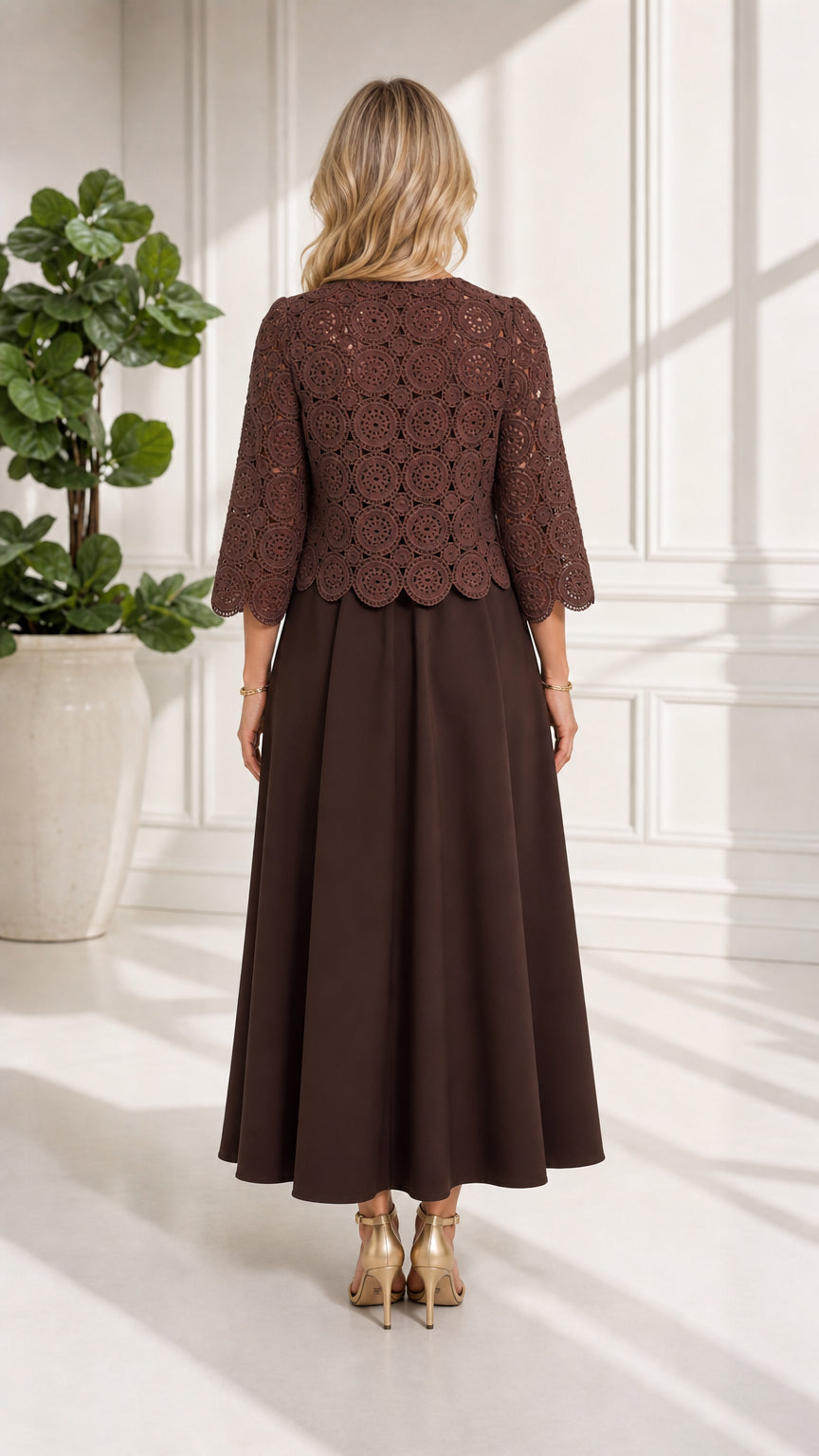 Back view of chocolate brown formal maxi dress with crochet bodice