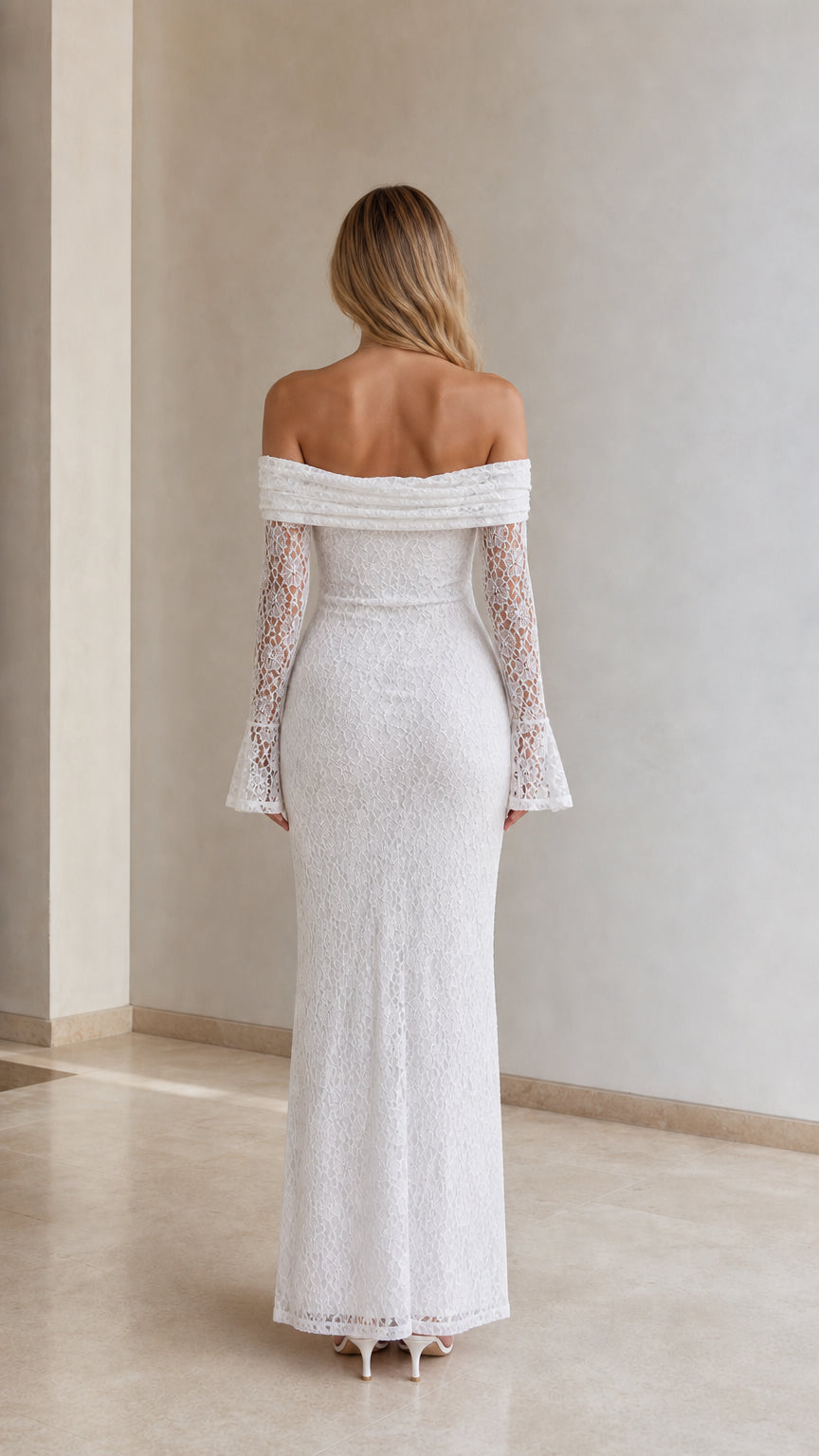 Back view of woman wearing white off-the-shoulder lace maxi column dress