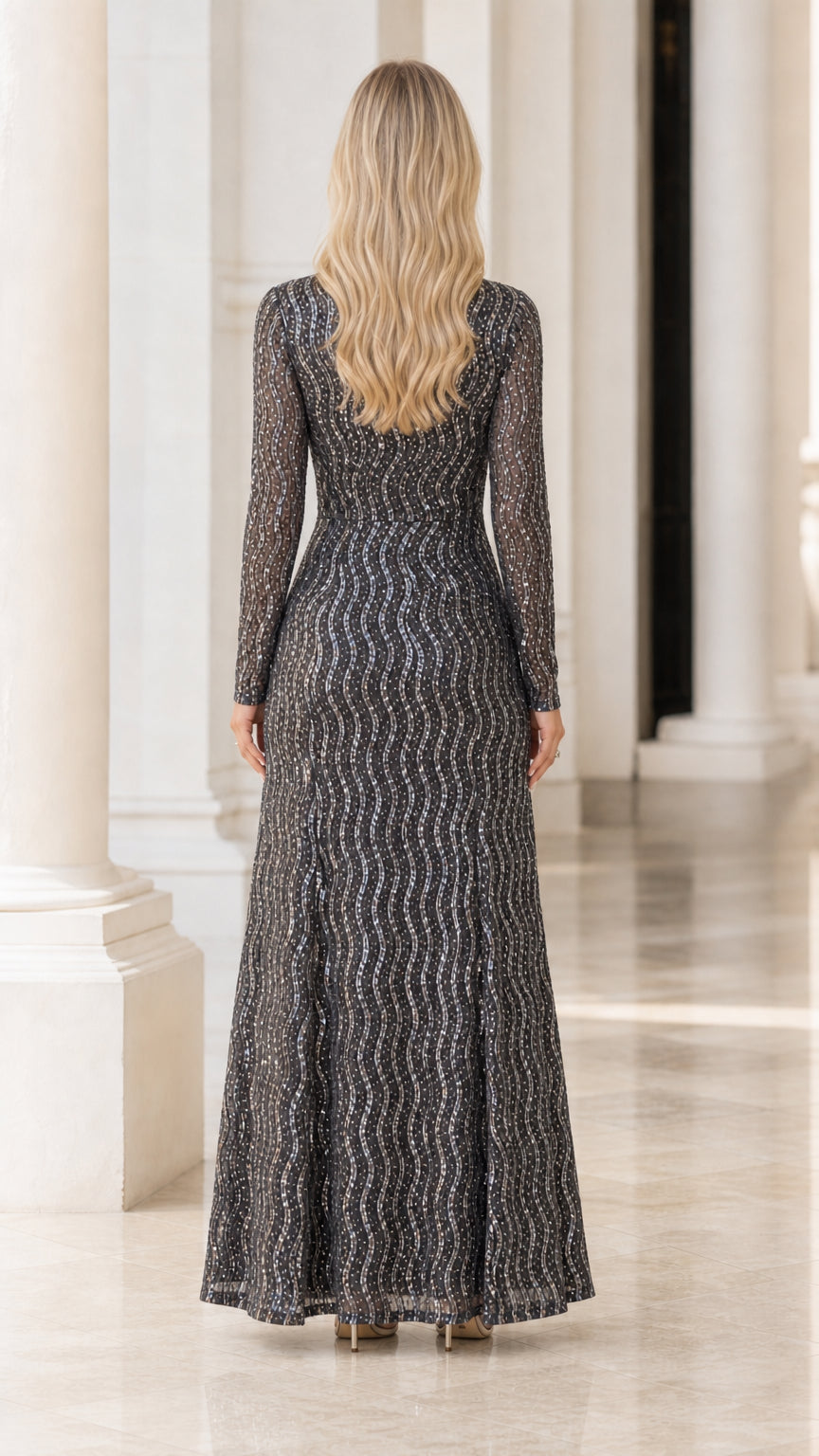 Back view of model in charcoal long sleeve sequin maxi dress