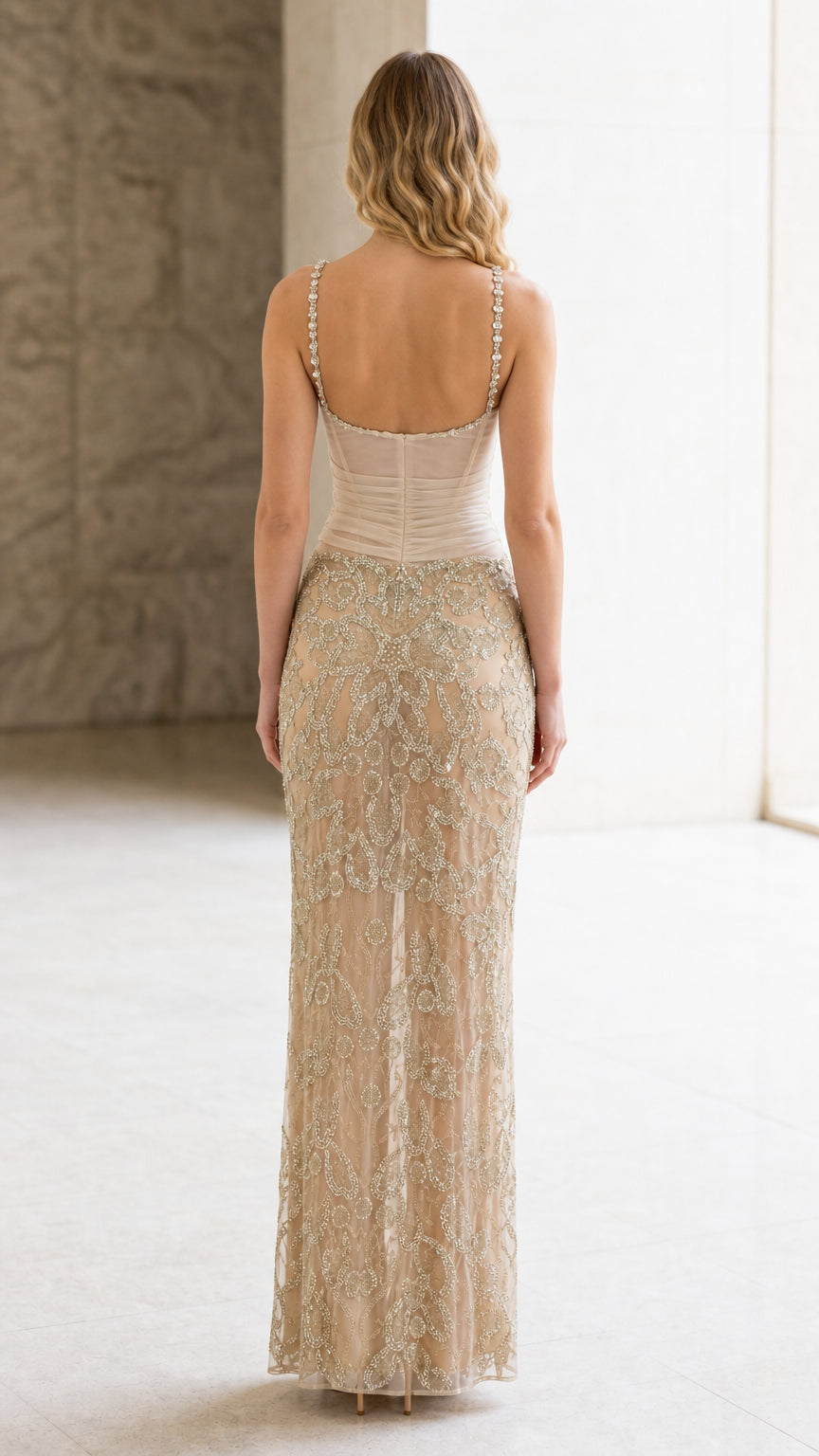 Back view of champagne low back sequin evening gown