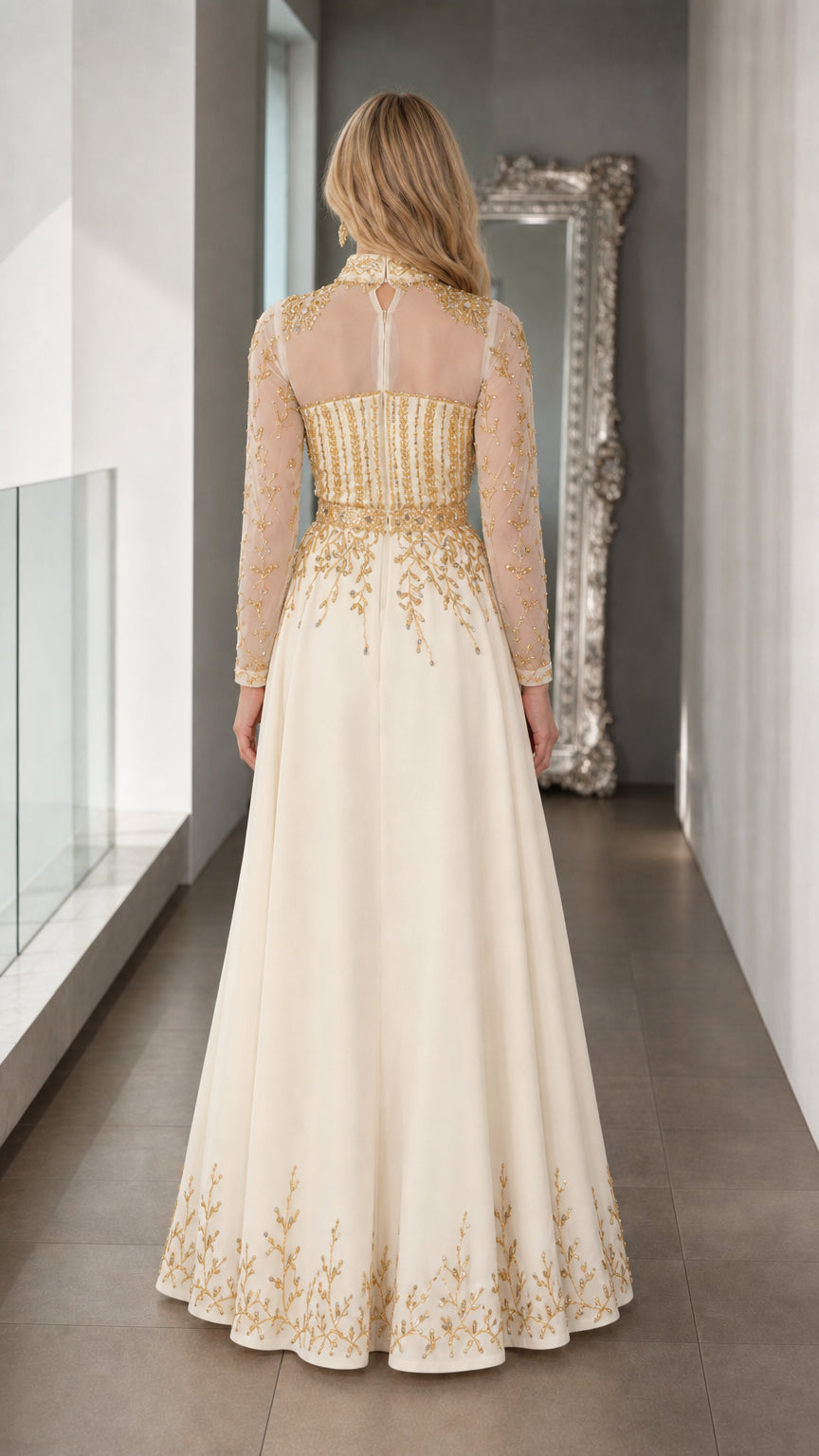 Back view of ivory formal jumpsuit showing sheer mesh back and flowing wide legs