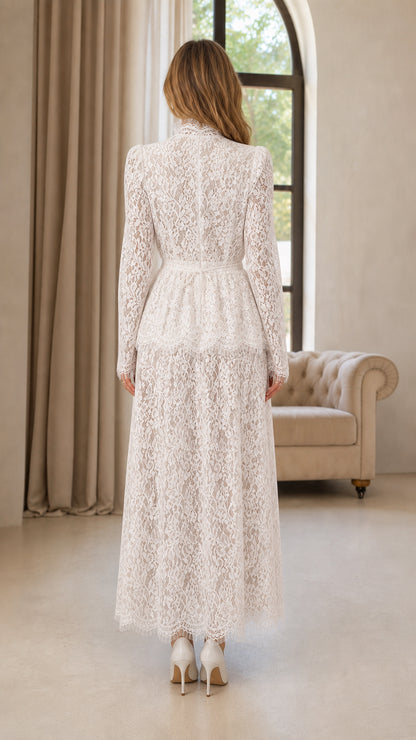 Back view of woman wearing white high neck lace evening jumpsuit