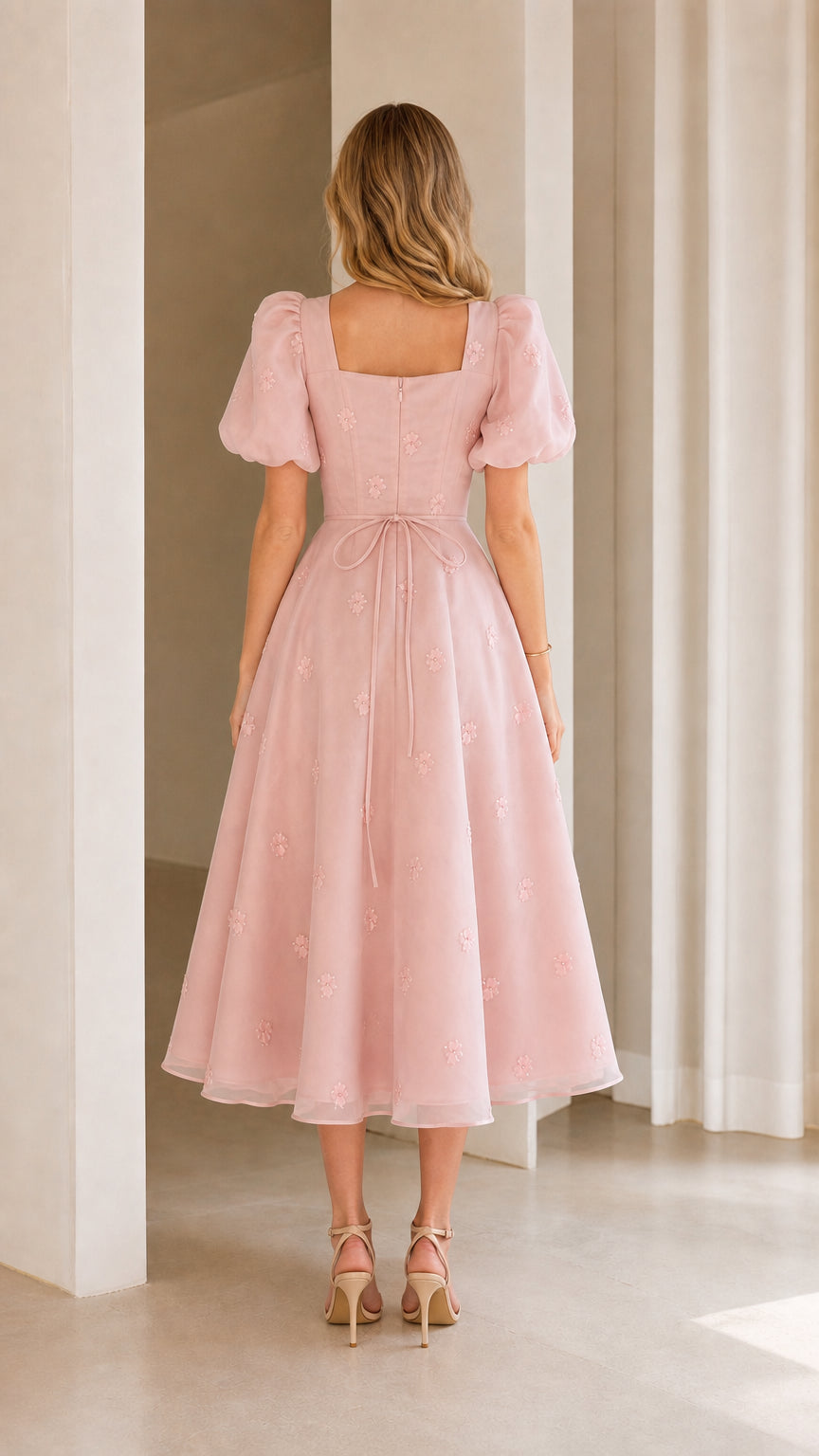 Back view of blush pink midi dress showing back square neck and tie sash