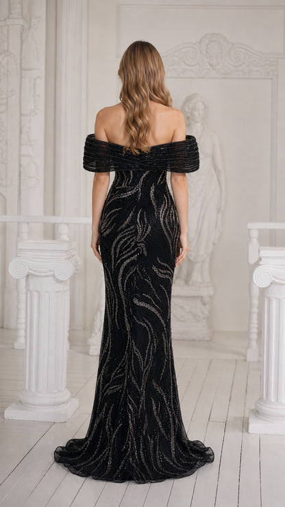 Back view of black sequined evening gown with sculpted shoulders