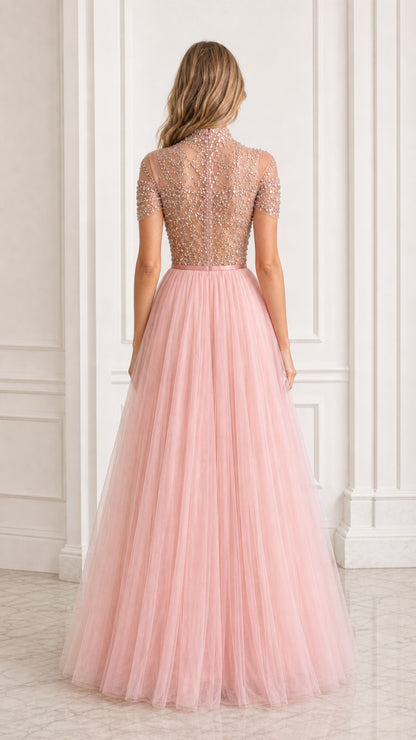 Back view of blush pink high neck tulle gown with beaded bodice