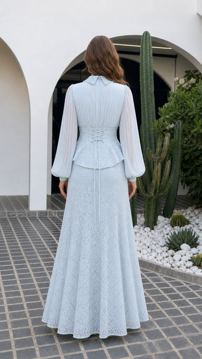 Back view of light blue lace maxi dress showing corset lace-up back detail