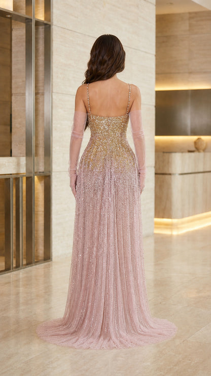 Back view of blush pink sequin and beaded evening gown with sweep train