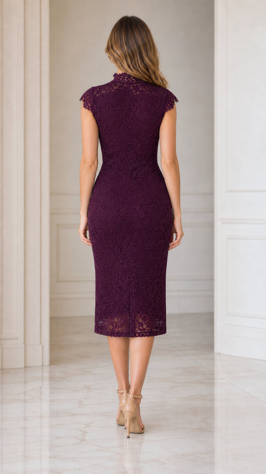 Back view of model showcasing the tailored fit of Deep Plum lace dress