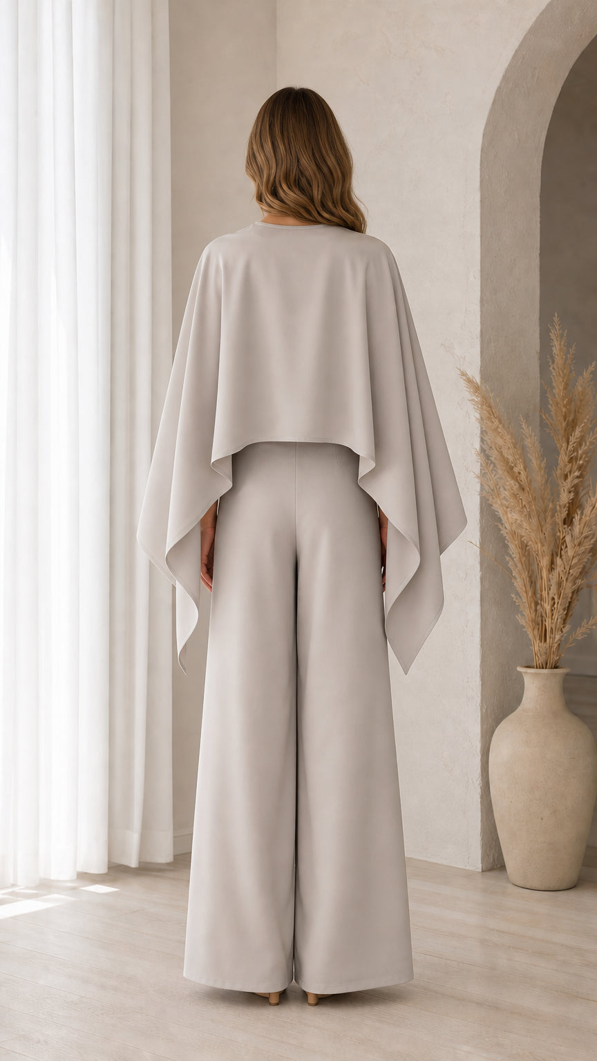 Back view of Light Grey capelet overlay and wide-leg palazzo trousers