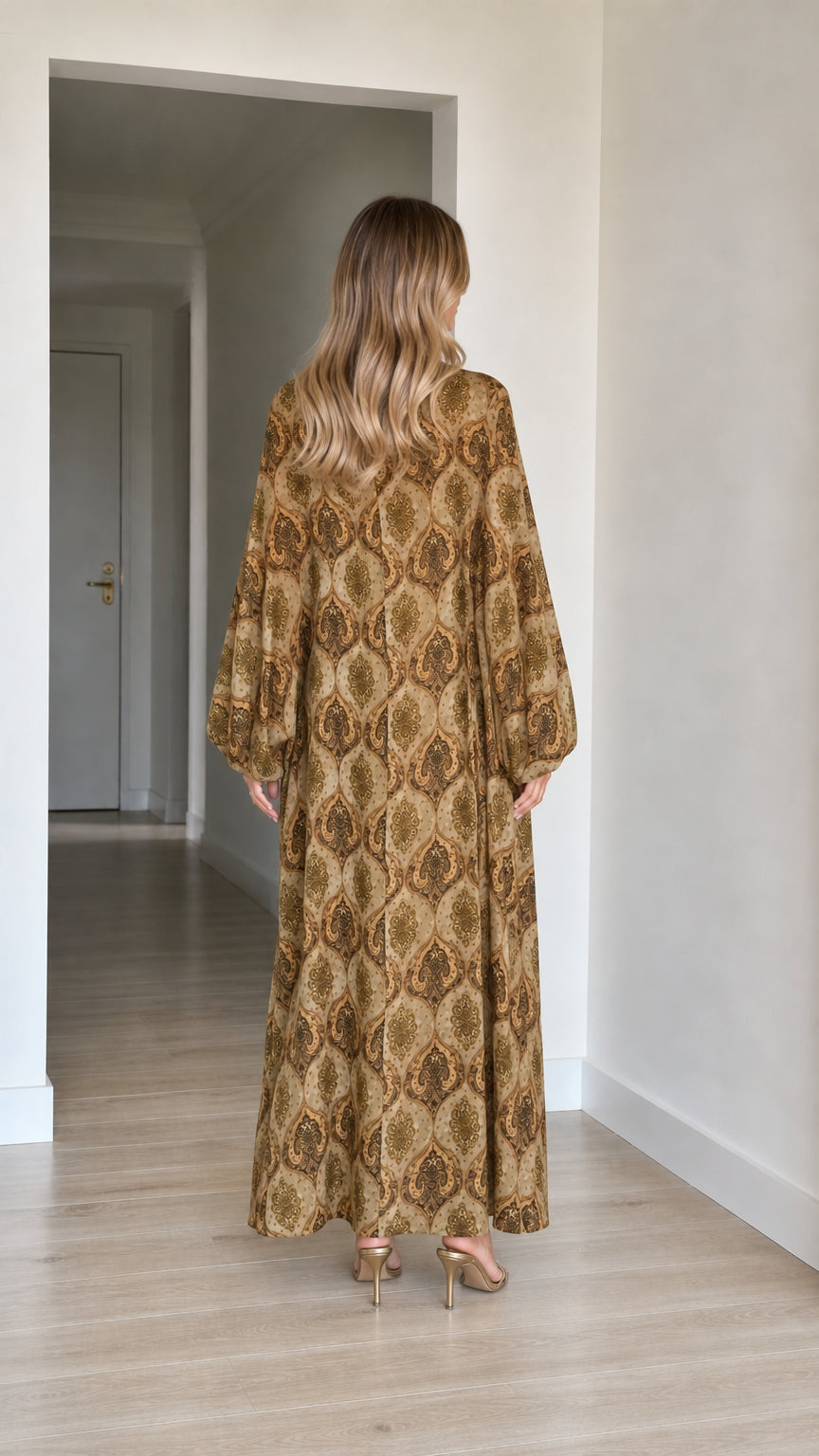 Back view of woman wearing Camel paisley pattern long sleeve maxi dress