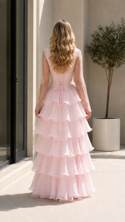 Back view of Blush Pink evening gown showing corset lace-up back and ruffled tiers