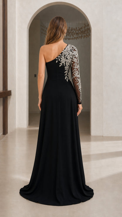 Back view of black one-shoulder maxi dress showing draped chiffon skirt