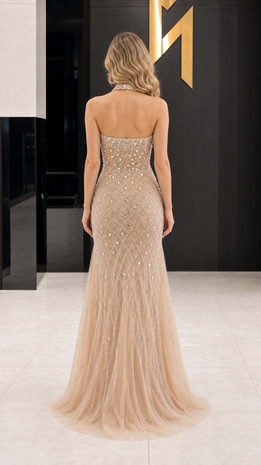 Back view of Champagne open-back halter evening dress