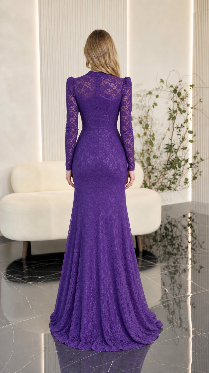 Back view of purple long sleeve lace evening gown showing fit and length
