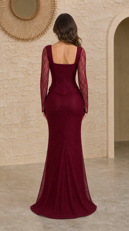 Back view of burgundy lace floor-length formal gown with structured bodice