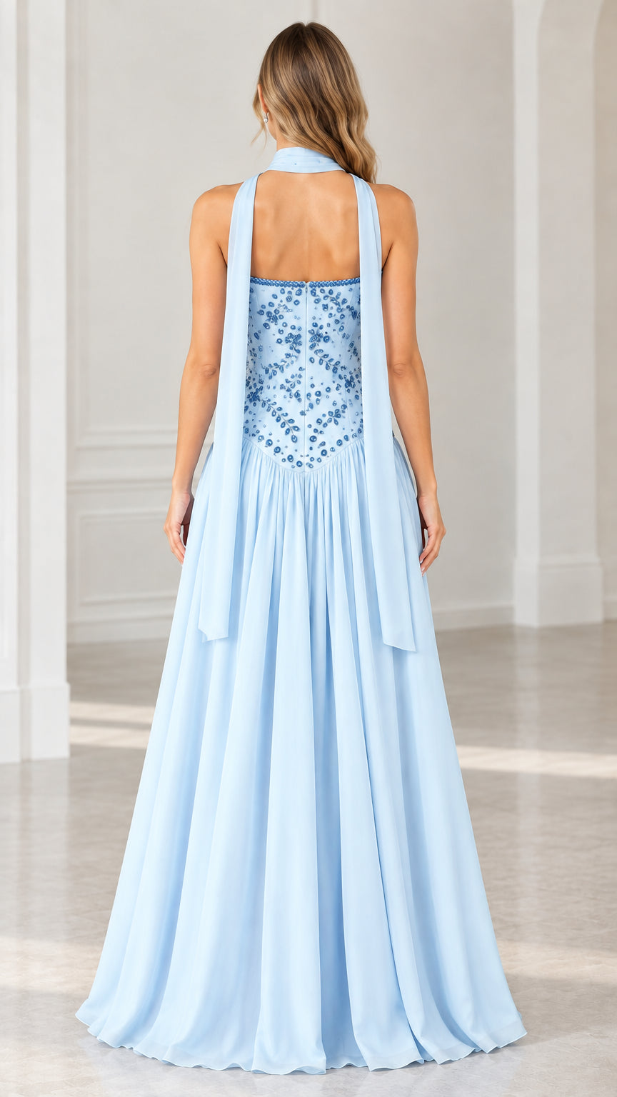 Back view of light blue formal gown showing trailing back scarf detail