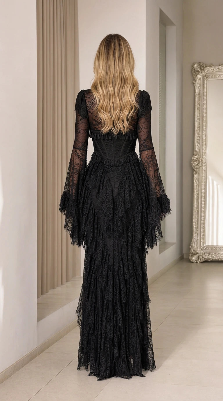 Back view of black lace maxi dress showing tailored fit and long sleeves