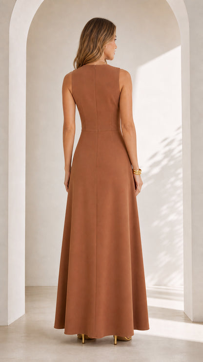 Back view of woman wearing tailored caramel brown sleeveless floor-length evening dress