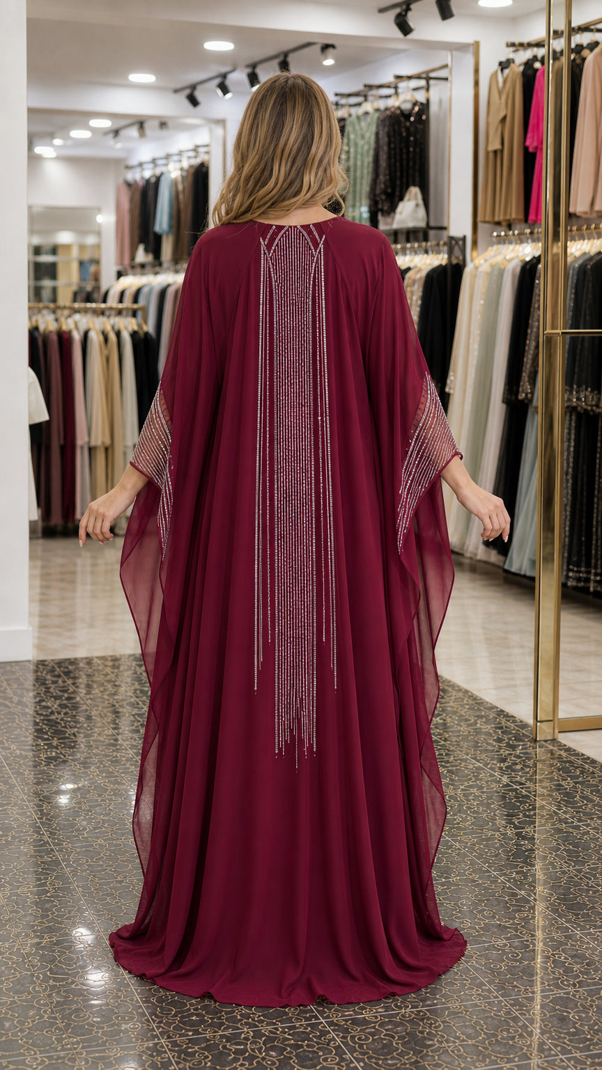 Back view of burgundy cape kaftan showcasing vertical rhinestone line design