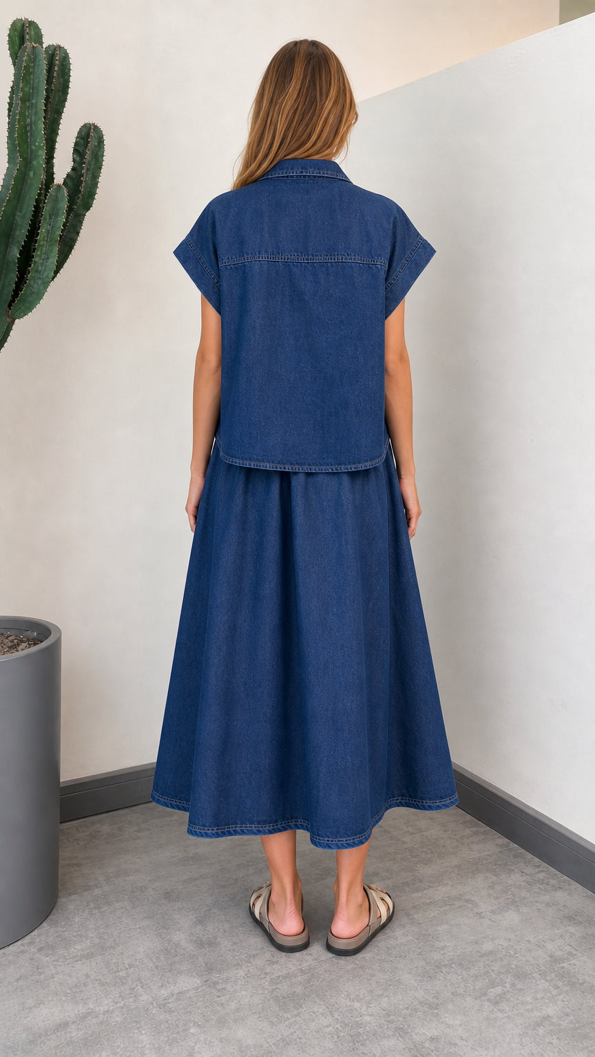 Back view of woman wearing Denim Blue matching denim shirt and skirt set