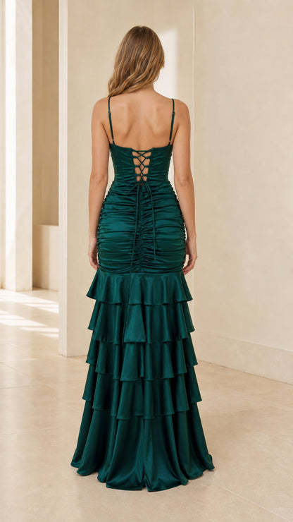 Back view of emerald green gown showing lace-up corset detail