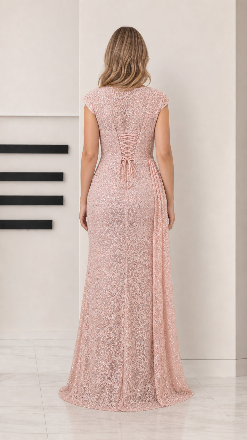 Back view of blush pink lace evening gown showing adjustable lace-up corset detail