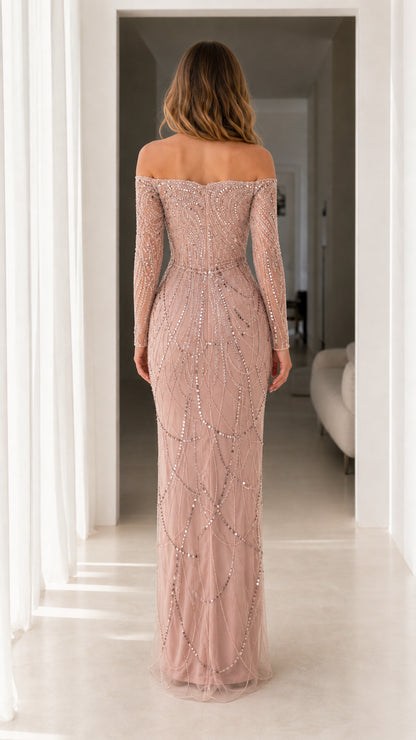 Back view of woman wearing off-the-shoulder dusty rose sequin evening gown