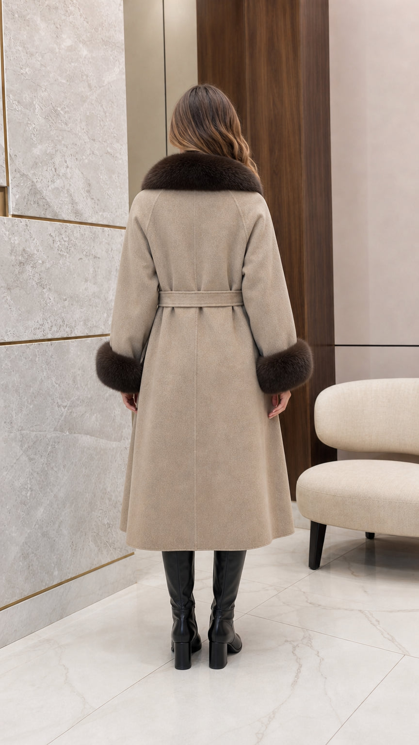 Back view of woman wearing the taupe long overcoat showing clean tailored lines