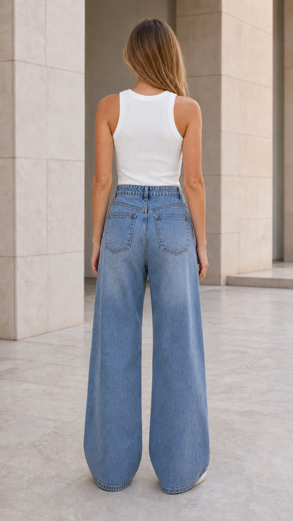 Back view of high-rise wide-leg denim pants showing pocket placement and relaxed fit