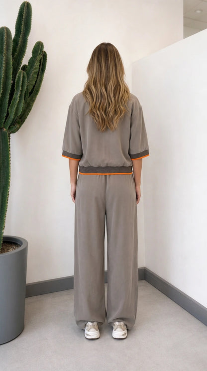Back view of model wearing grey two-piece wide-leg lounge set