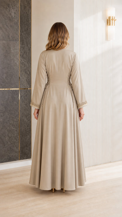 Beige modest evening maxi dress back view showing flowing drape