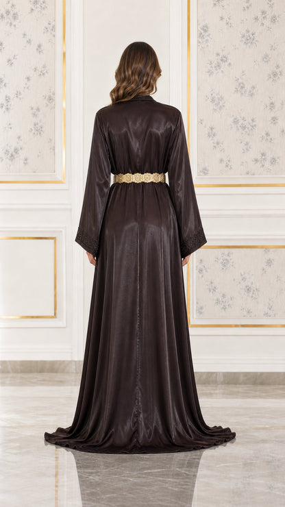 Back view of floor-length dark brown satin formal dress with metallic belt