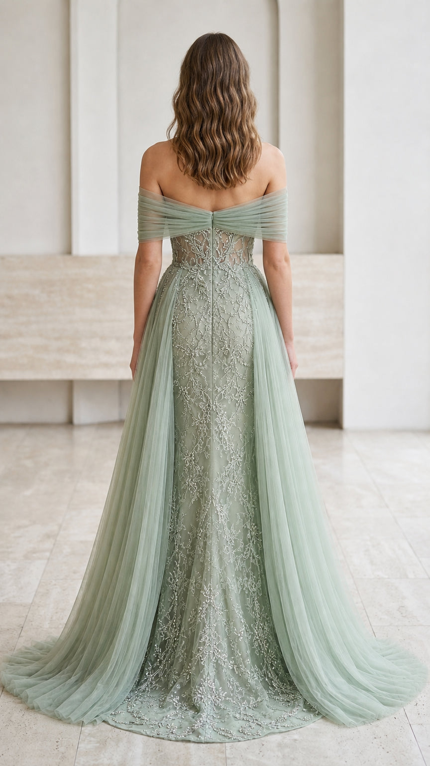 Back view of sage green beaded tulle gown showing sweetheart back and long sheer train