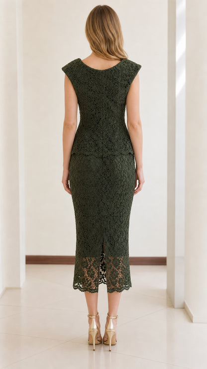 Back view of woman wearing dark green lace midi dress with back slit
