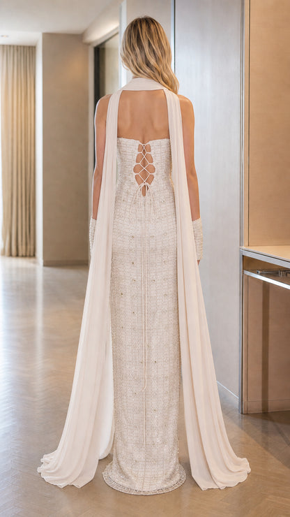 Back view of the Ivory White evening gown showcasing the corset lace-up closure and sweeping chiffon train